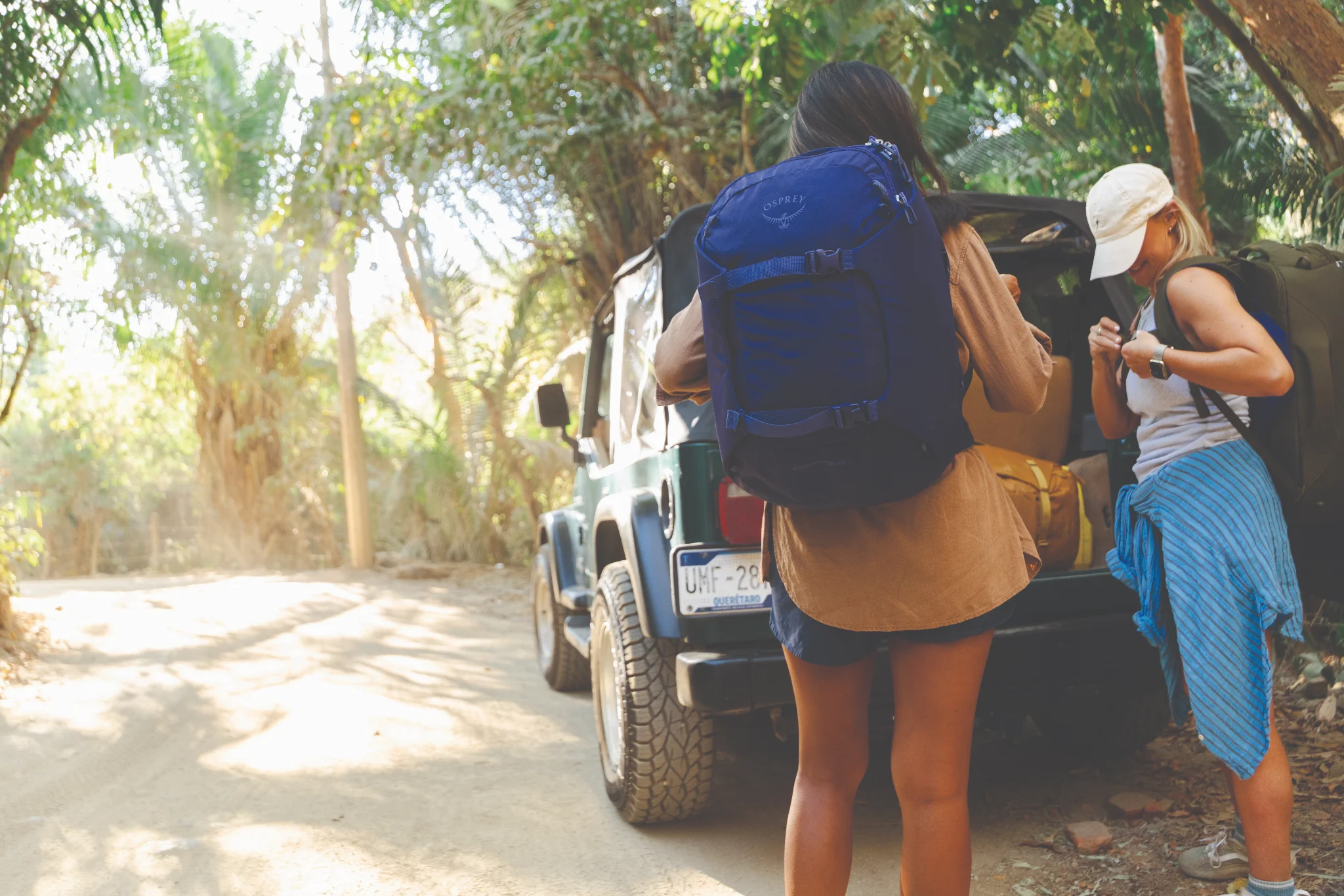 Osprey Sojourn Porter wheeled travel pack in use