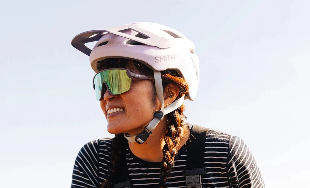 Rider wearing the SMITH Pilot Mips helmet on a trail
