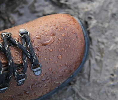 Water beading off a treated waterproof jacket